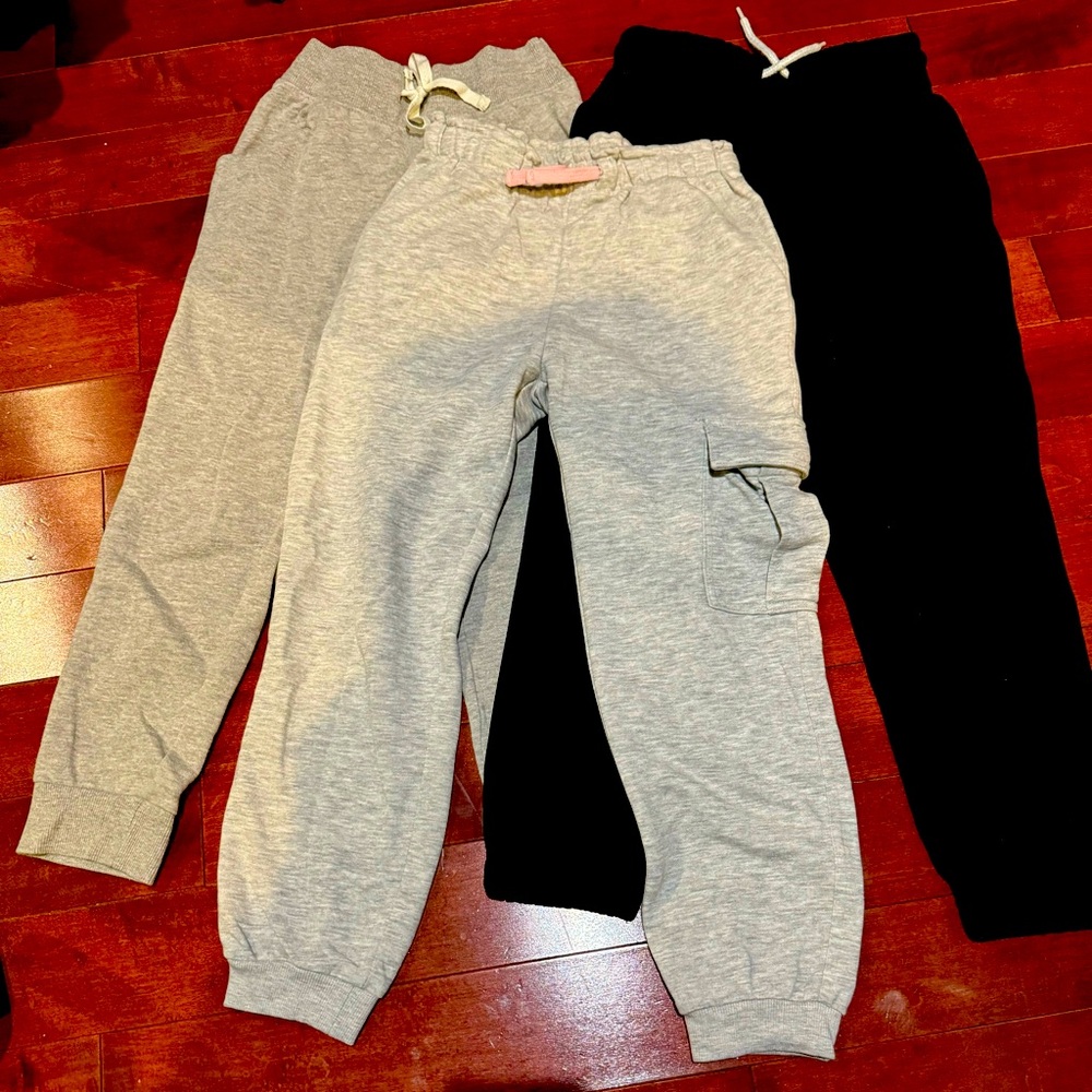 Girls joggers. 3 pairs-grey cargo joggers; grey joggers;black joggers